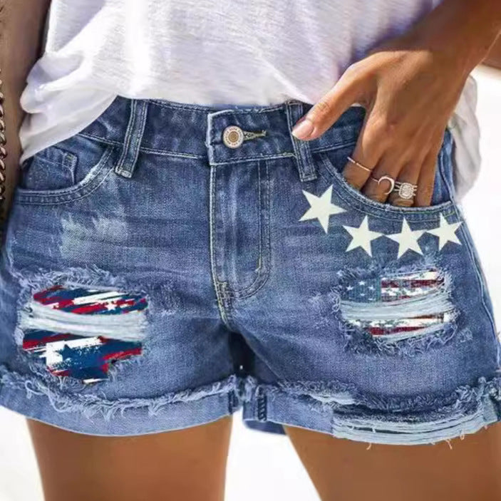 Printed ripped and flanged denim shorts for women