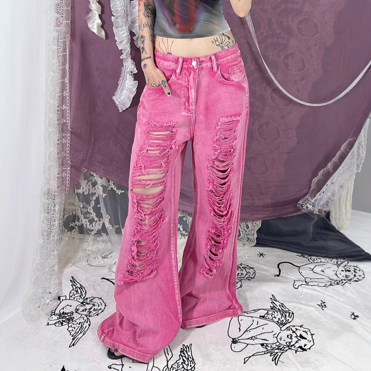 Perforated and hollowed out low waisted jeans for women