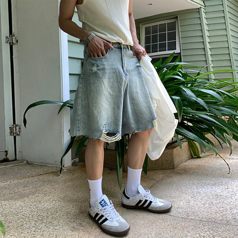 Washed distressed denim shorts for men