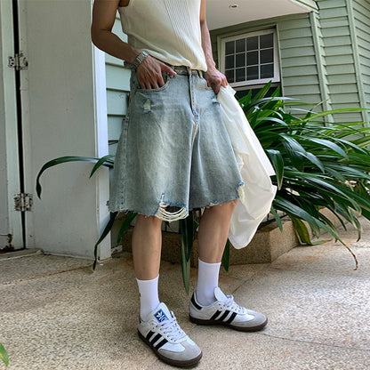 Washed distressed denim shorts for men