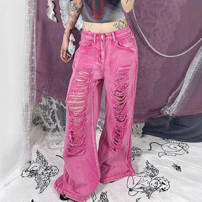Perforated and hollowed out low waisted jeans for women