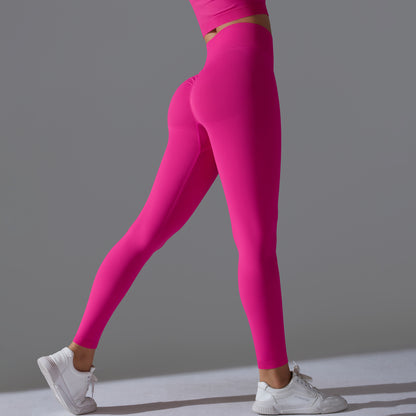 Seamless Solid Peach Sports Trousers for Women - Tight Running Fitness Yoga Pants with High Waist and Butt-Lifting Design