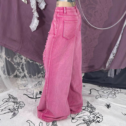 Perforated and hollowed out low waisted jeans for women