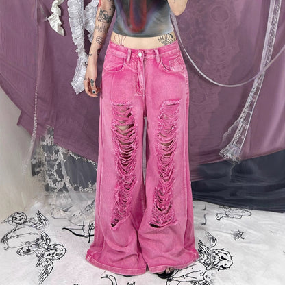 Perforated and hollowed out low waisted jeans for women