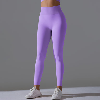Seamless Solid Peach Sports Trousers for Women - Tight Running Fitness Yoga Pants with High Waist and Butt-Lifting Design