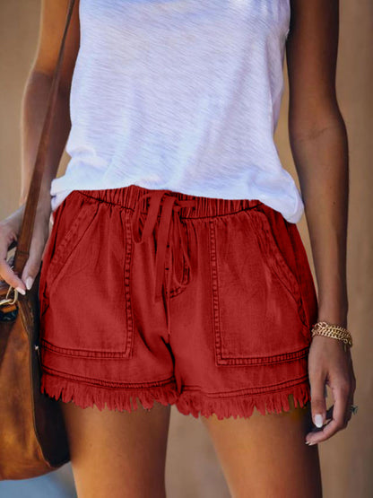 Elastic waist fringe denim shorts for women