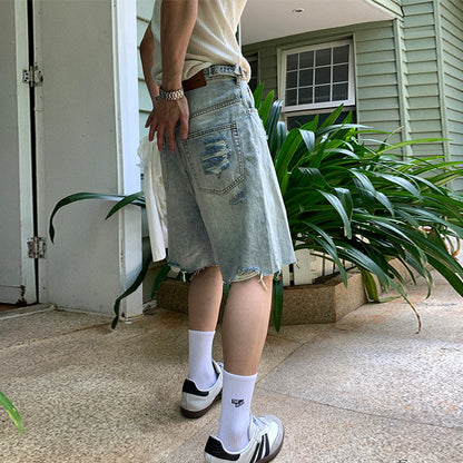 Washed distressed denim shorts for men