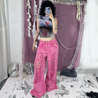 Perforated and hollowed out low waisted jeans for women